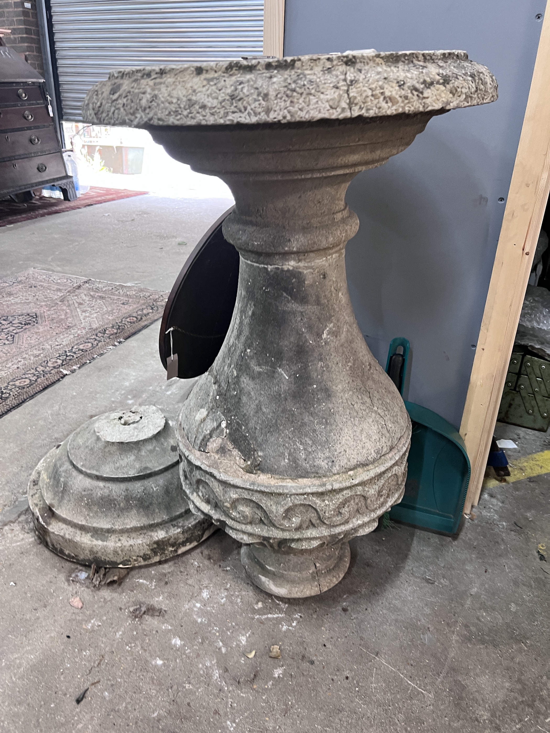 A reconstituted stone baluster sundial base, diameter 49cm, height 107cm (a.f.)